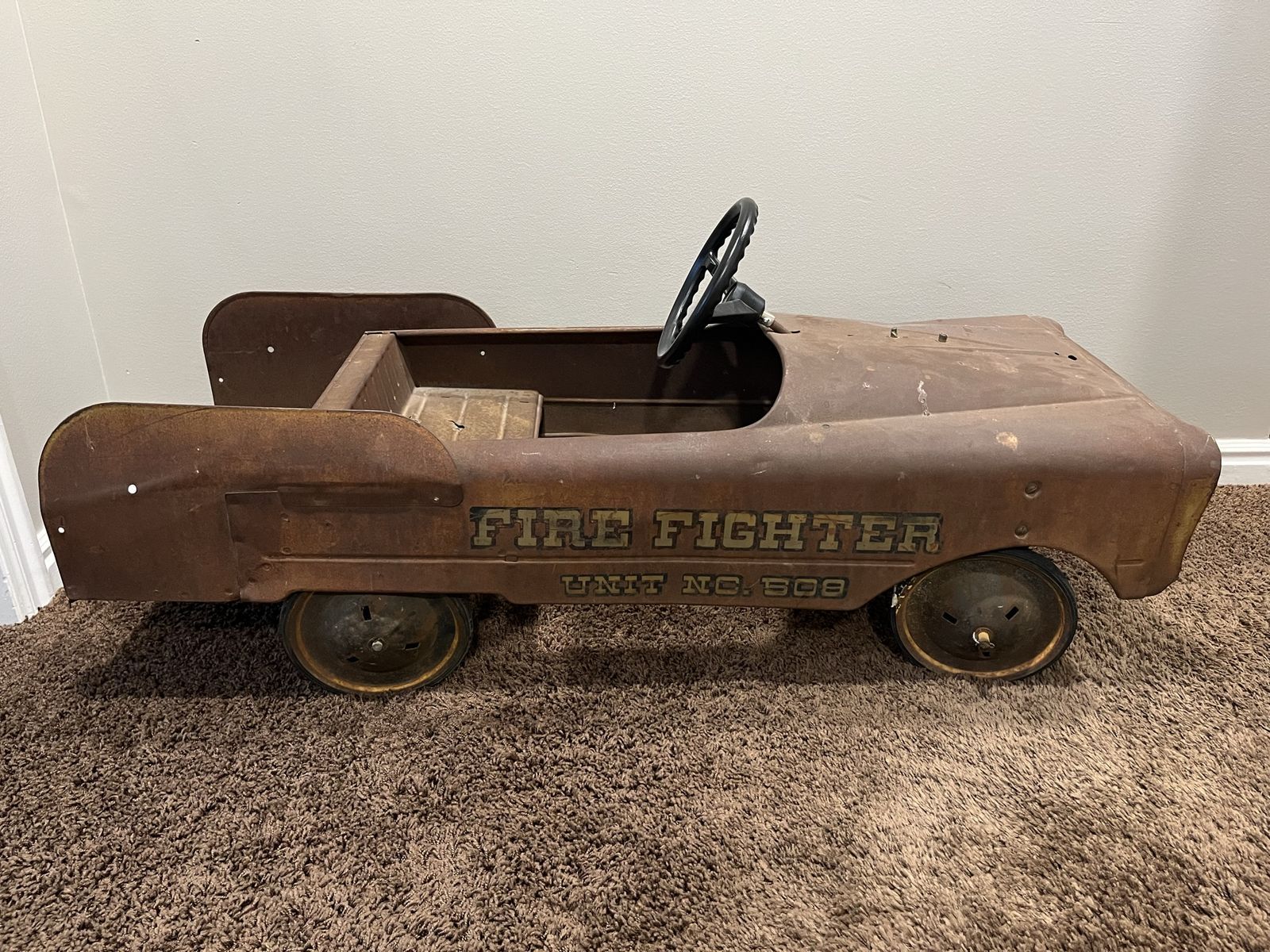 Vintage Murray Sad Face pedal car fire truck