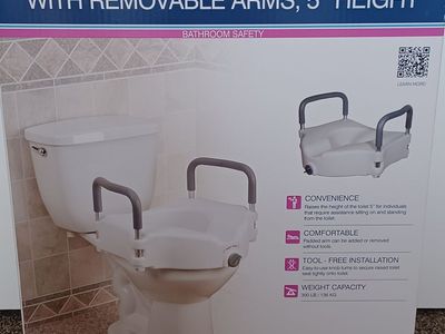 Toilet seat height extension