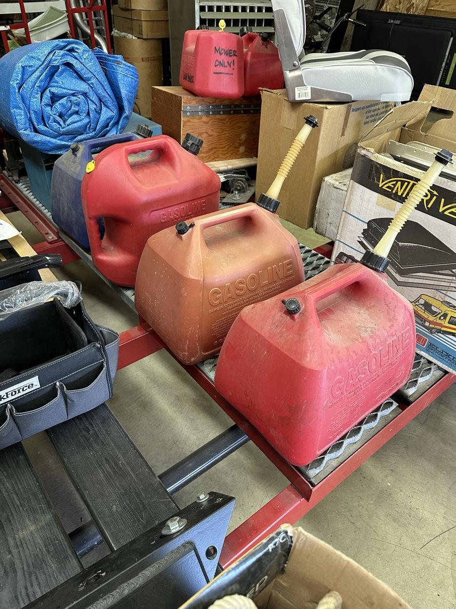 Assorted Gas and Diesel Fuel Cans (5 Gallon Containers). 