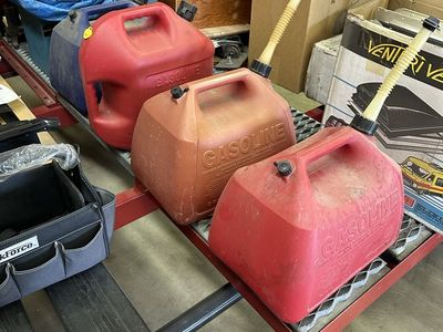 Assorted Gas and Diesel Fuel Cans (5 Gallon Containers).