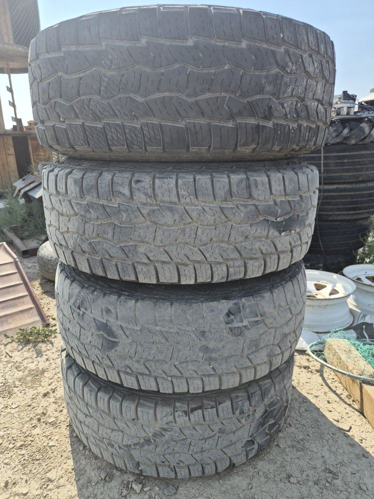 5 All Terrain LT285/75R16 Tires on Black Steel Wheels 8 on 6.5