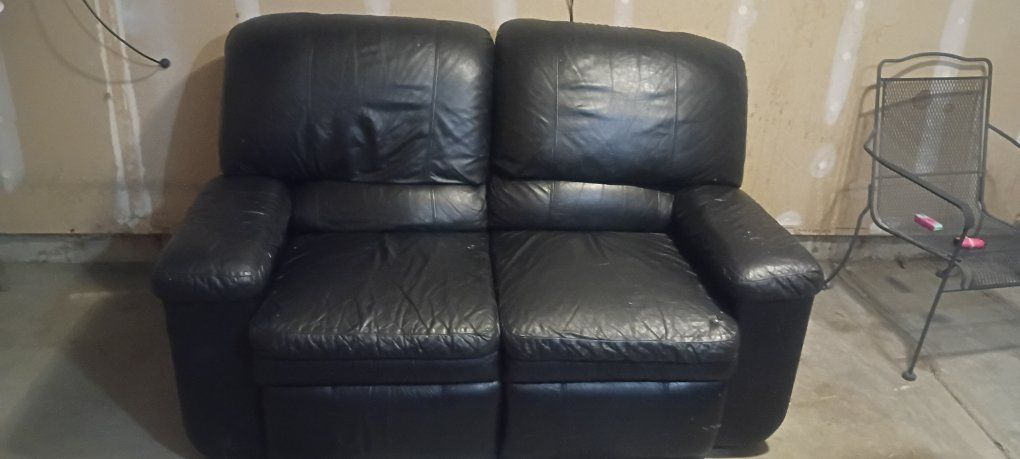 Black Leather Reclining Loveseat