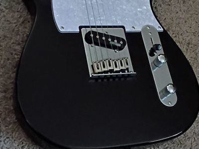 Black Telecaster guitar