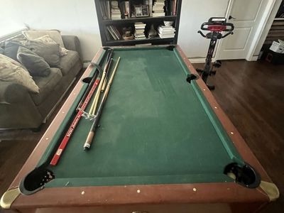 Used Pool Table with Green Felt and Wooden Frame - Includes Cues and Accessories