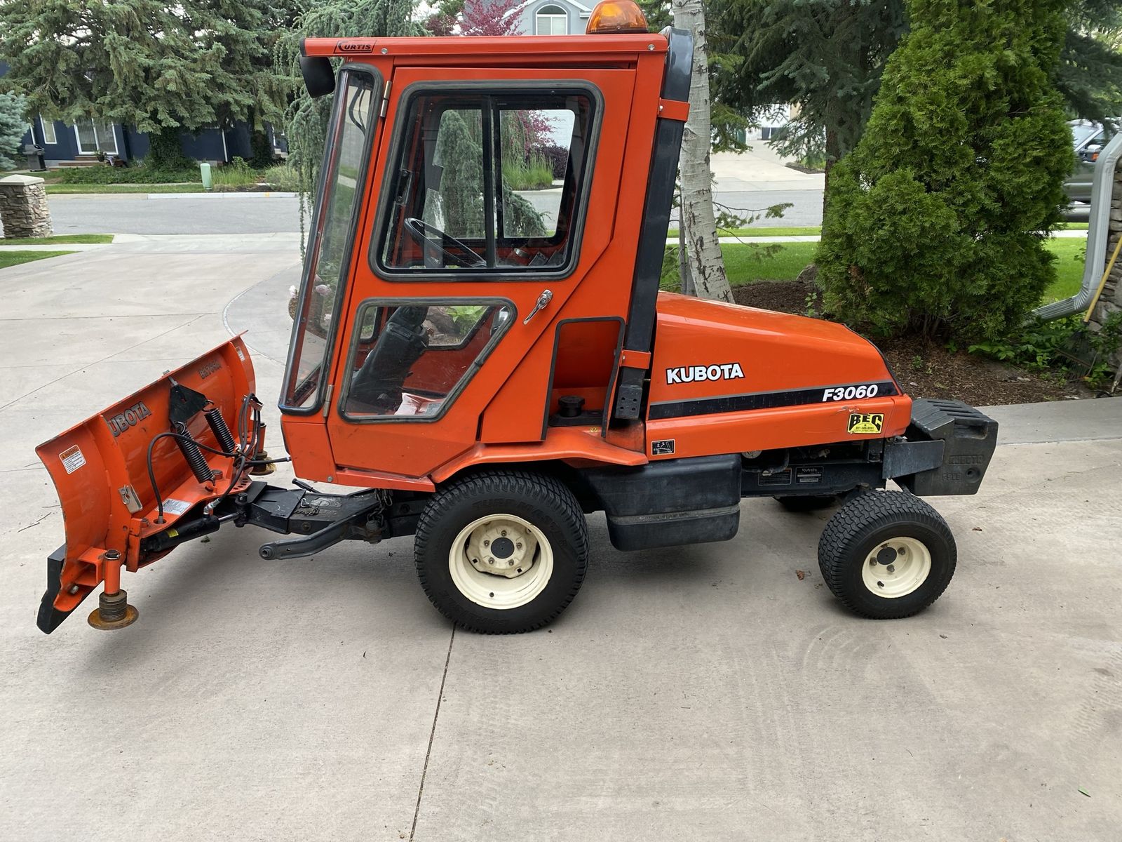 Kubota F3060 Front Mount with Cab and Snow Plow - Versatile & Robust 4x4