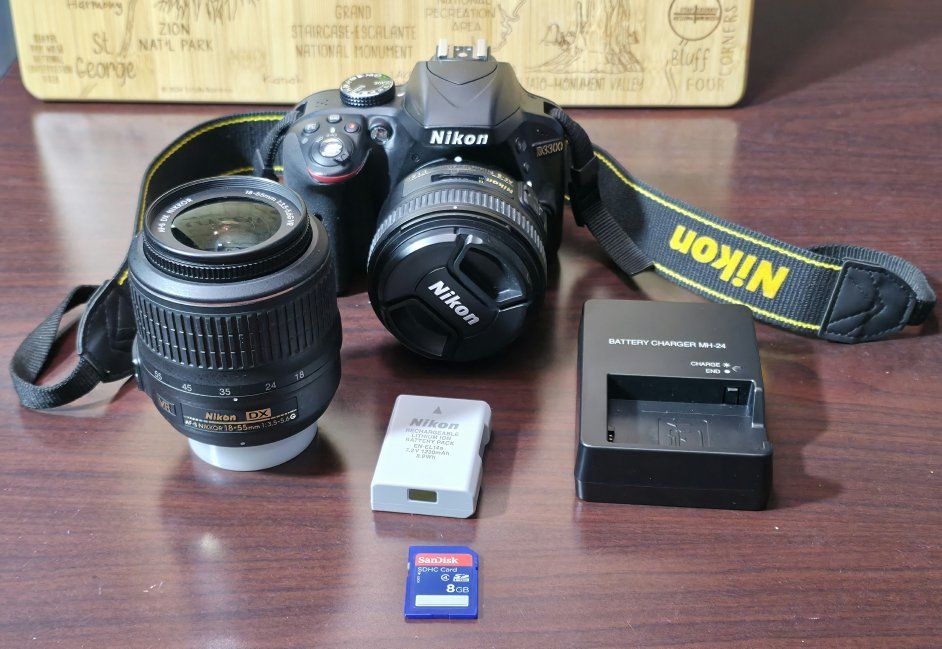 Nikon D3300 24.2 MP CMOS Digital SLR and 2 lenses.