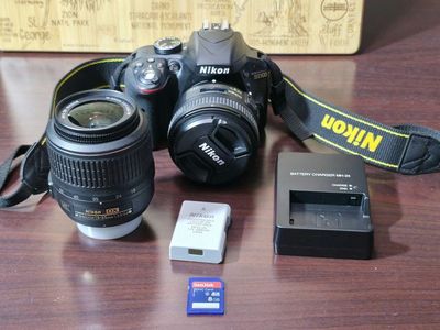 Nikon D3300 24.2 MP CMOS Digital SLR and 2 lenses.