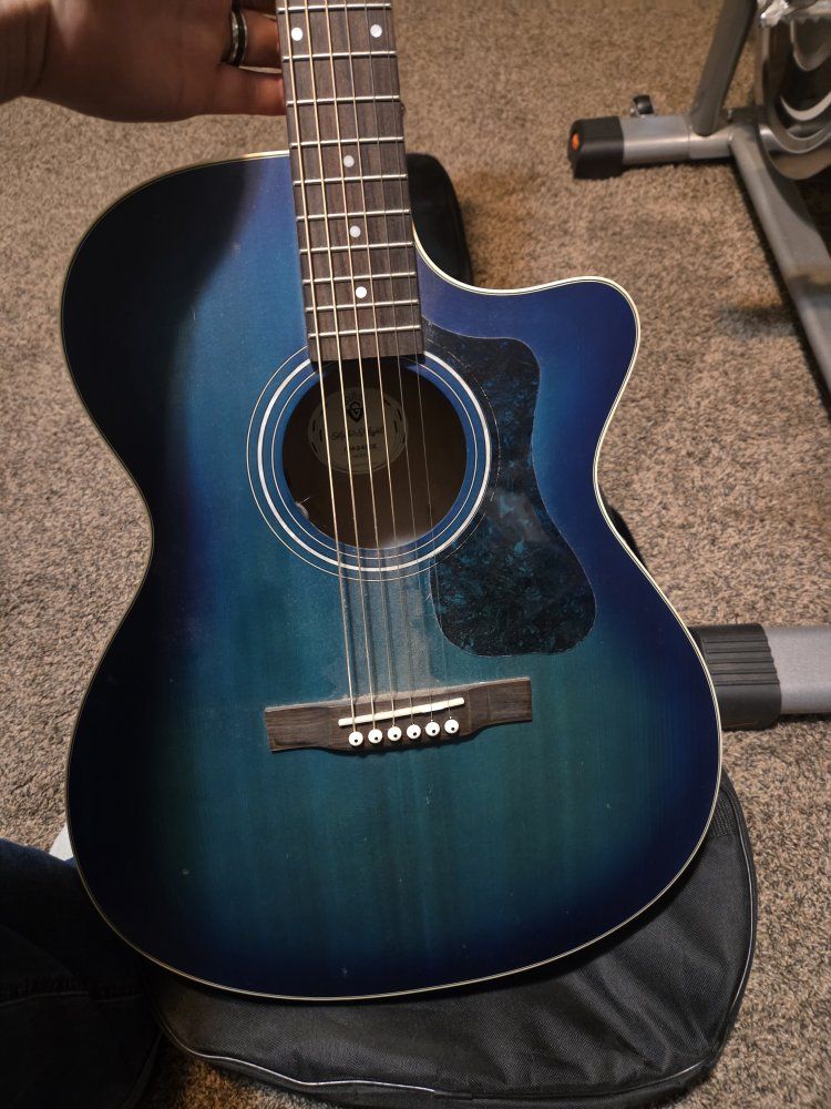 Guild OM-240CE Blue Acoustic Guitar.