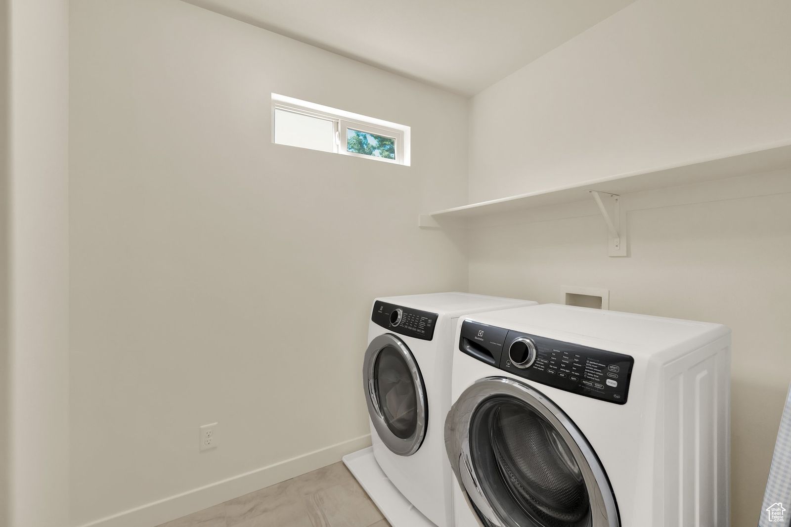 Electrolux Front Loading Washer and Electric Dryer