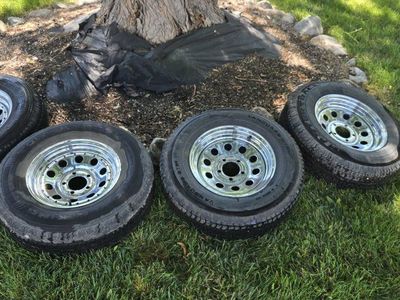 Set of 4 205/75R14 trailer wheels and tires. Load Range C. 5x4.5