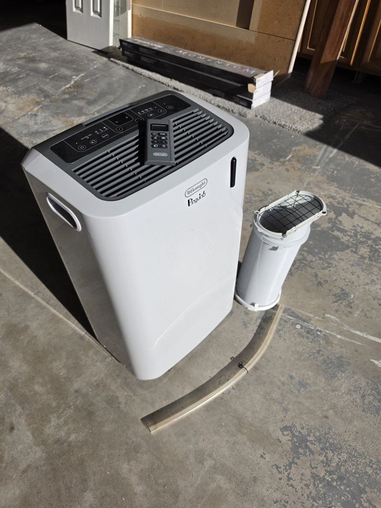 A\C FLOOR UNIT De'Longhi 500 Sq. Ft. Portable Air Conditioner, Light Grey