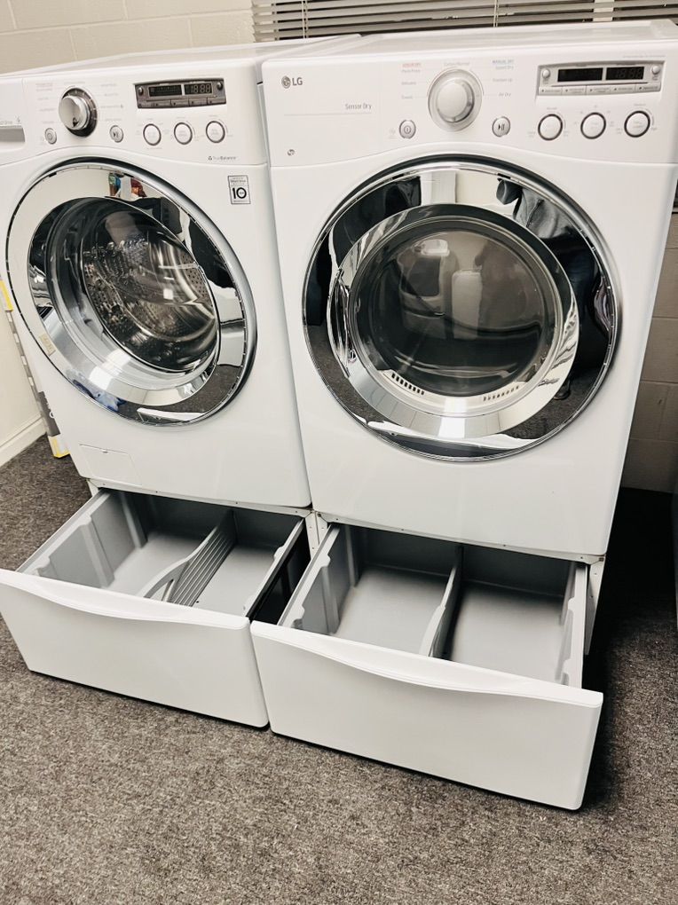 LG Washer And Dryer Set With Pedsatals