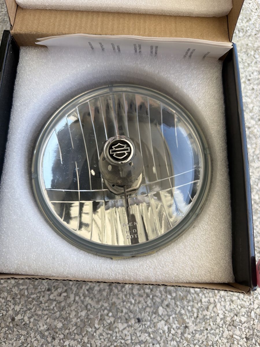 Code 4 LED C4-HD575-BL Harley Davidson 5.75" Headlight Bulb with Harley Logo
