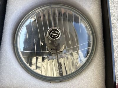 Code 4 LED C4-HD575-BL Harley Davidson 5.75" Headlight Bulb with Harley Logo