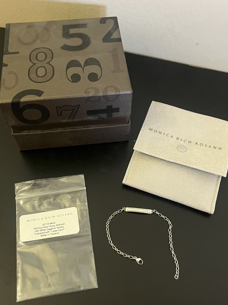 Sterling Silver Bracelet w/ White Sapphire Reg$400