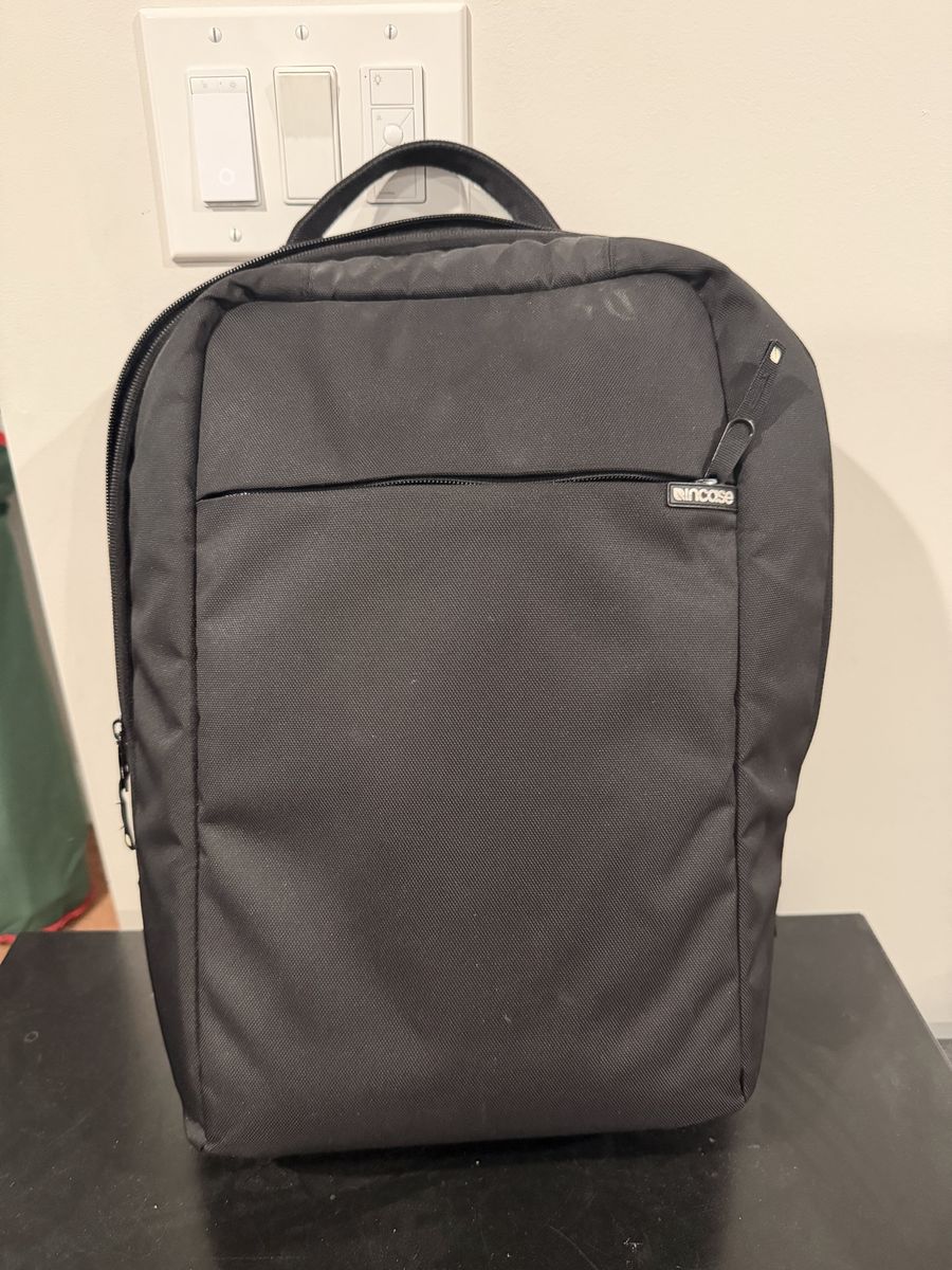 Incase cross body laptop backpack