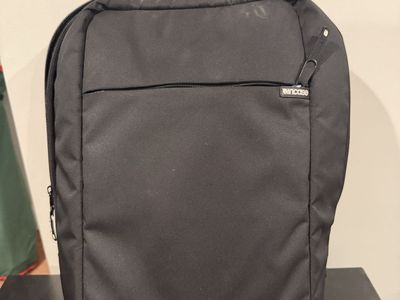 Incase cross body laptop backpack