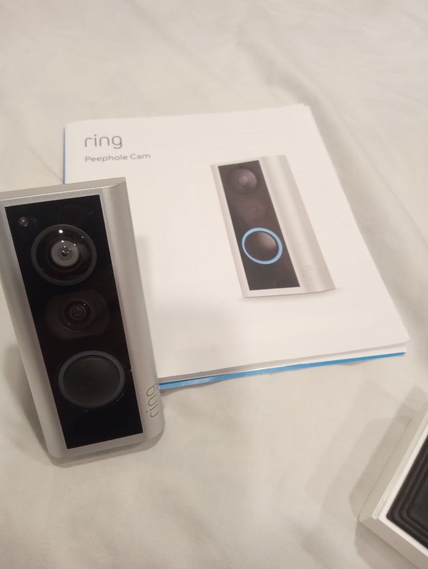 Ring Peephole Cam Smart Video Doorbell with 2 Batteries - New without packaging, never been installed.