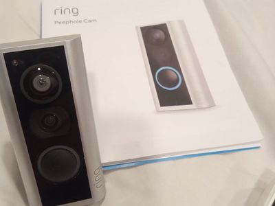Ring Peephole Cam Smart Video Doorbell with 2 Batteries - New without packaging, never been installed.