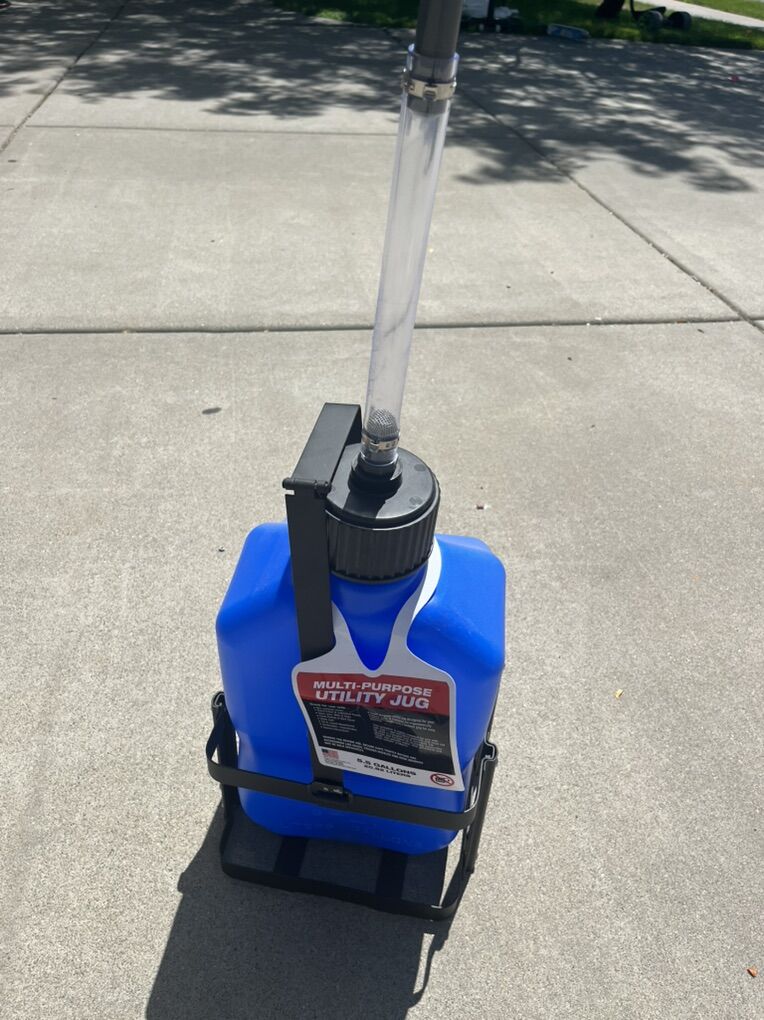 Gas Or Water Jug 5.5 Gal With Metal Carrier NEW!