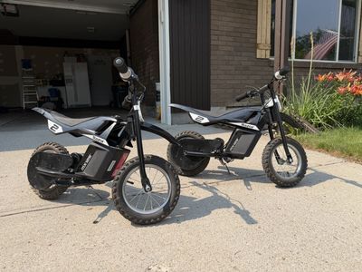 Pair of Razor MX125 Dirt Rocket Electric Dirt Bikes - Black, Used Condition