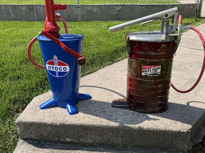 Vintage oil pump dispensers
