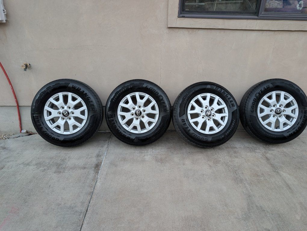 Toyota OEM 17 Silver Alloy Wheels Goodyear Wrangler Territory HT 245/70R17 Tires