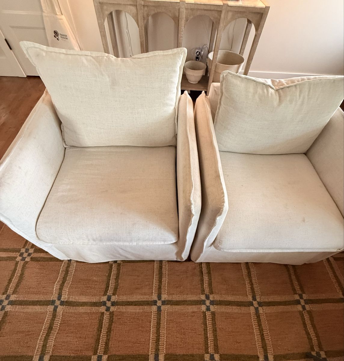 Two Cream Slipcovered Lounge Chair