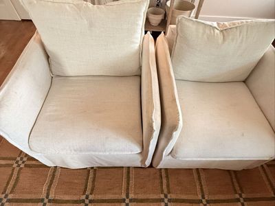 Two Cream Slipcovered Lounge Chair