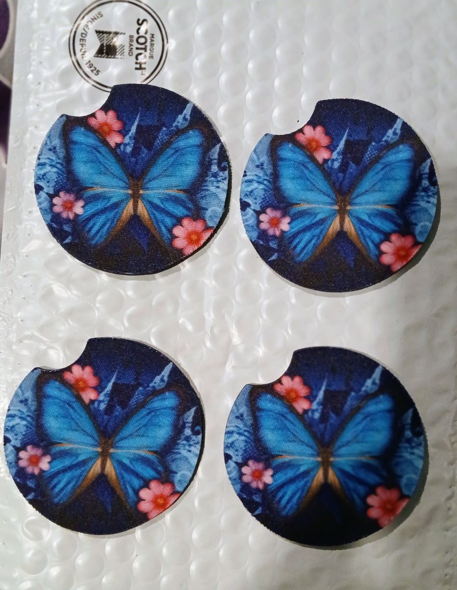 4 Brand New soft blue butterfly car cup holder.