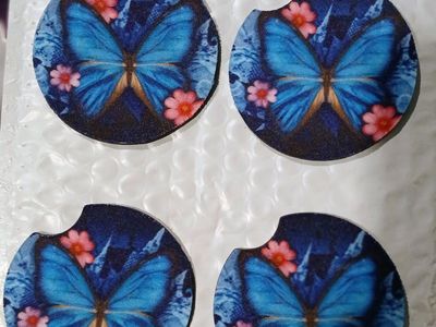 4 Brand New soft blue butterfly car cup holder.