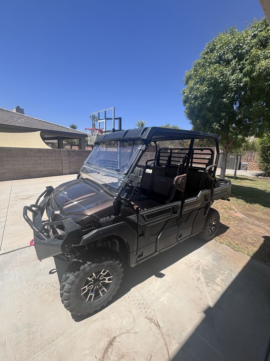 2023 Kawasaki Mule Pro-FXT Side-by-Side UTV with Hard Top, Windshield, winch, and gun rack.