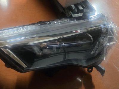 Unbranded Clear Headlight Assembly - New, Still in Plastic
