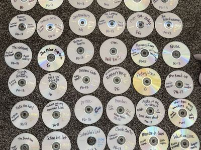 60 Family Friendly DVD’s and Audiobooks with 128 slot Vault Case with locking Key
