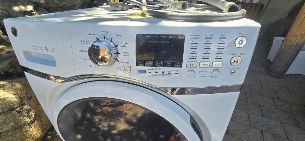 PENDING PICK UP - FREE.  GE Profile Front Load Washer - White, Steam Technology, Vibration Control, HE Energy Star