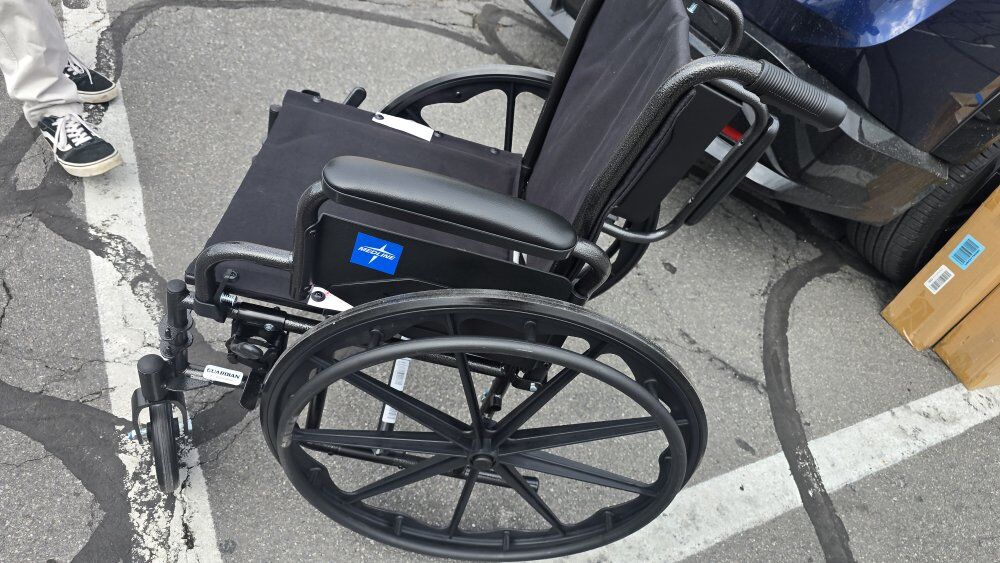 Medline Folding Wheelchair with Swing-Back armrest