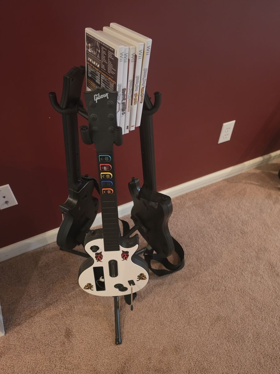Guitar Hero Controller Bundle with Wii Games and Stand