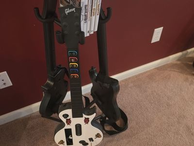 Guitar Hero Controller Bundle with Wii Games and Stand