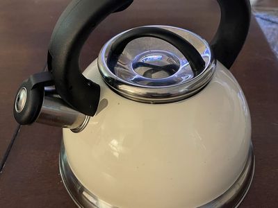 Creative Home Cream Enamel Whistling Tea Kettle with Black Handle - Stainless Steel Base, Used