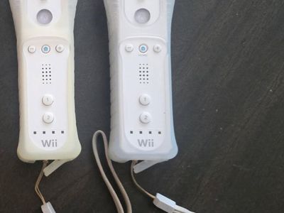 Nintendo Wii controllers with covers $20 each! trades considered!