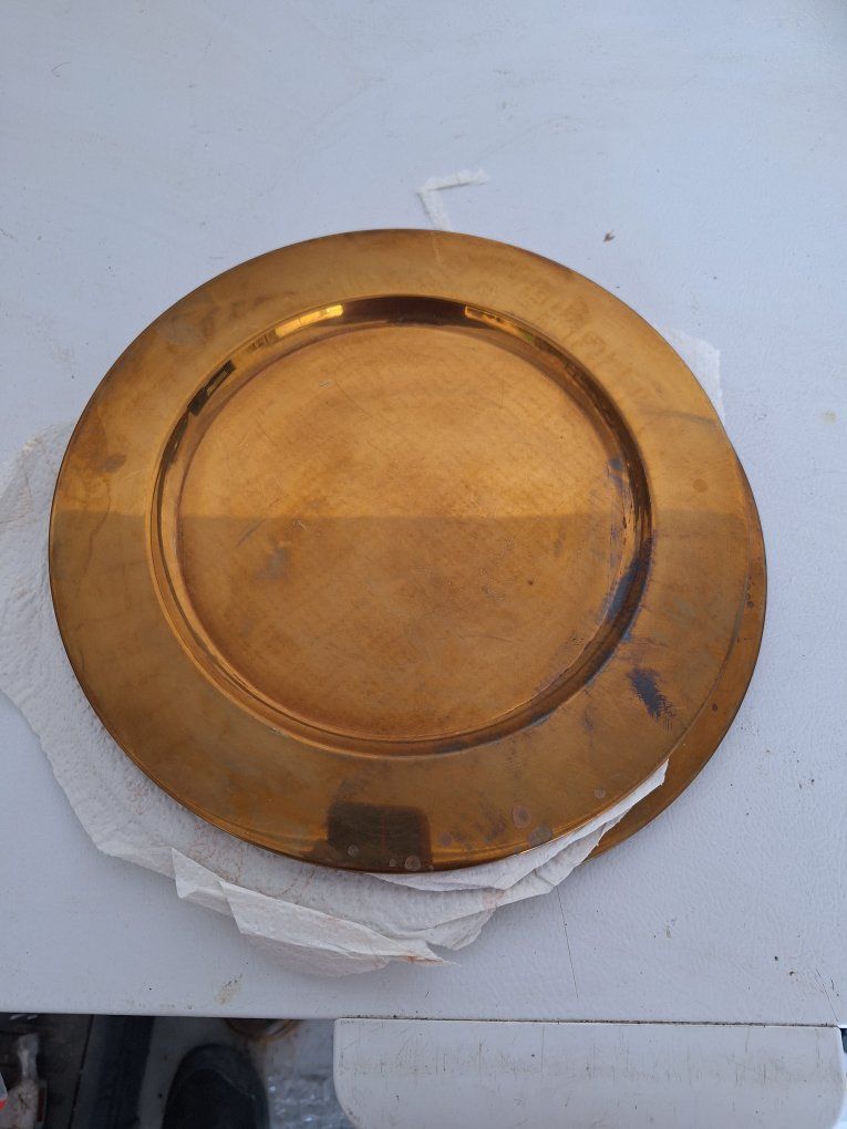 four bronze chargers