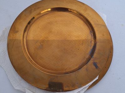 four bronze chargers