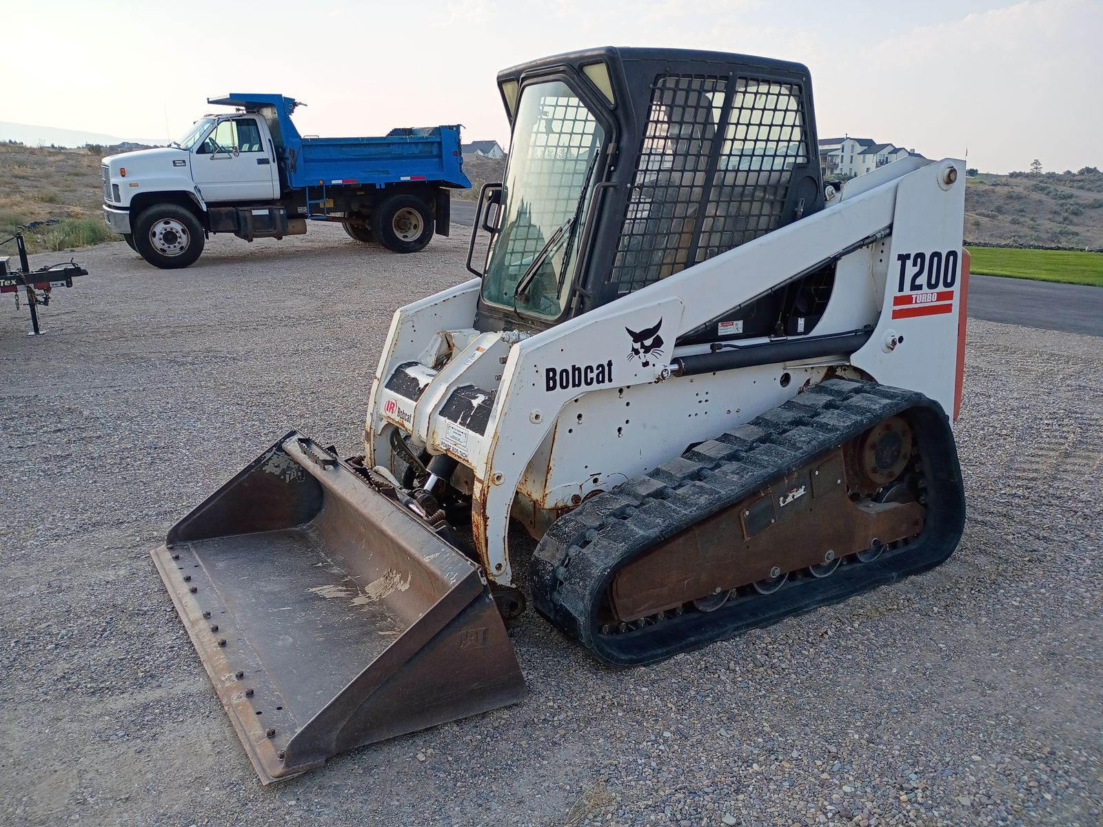 2001 Bobcat T200 Skid Steer Package w/ Attachments + Iron Bull 21' Trailer