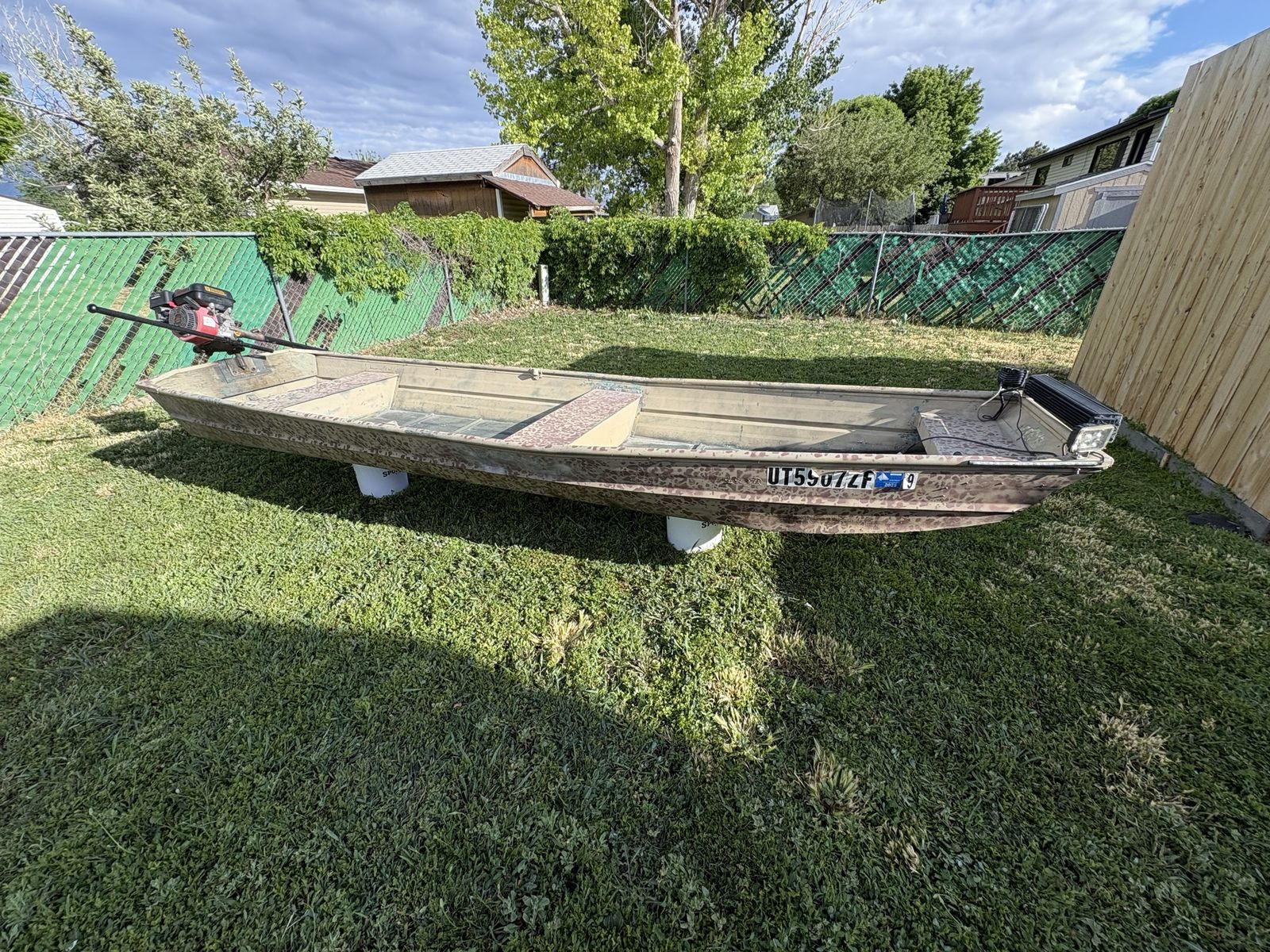 14 ft Jon boat with 224 cc motor long tail