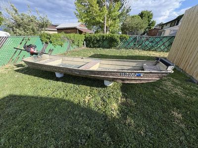 14 ft Jon boat with 224 cc motor long tail