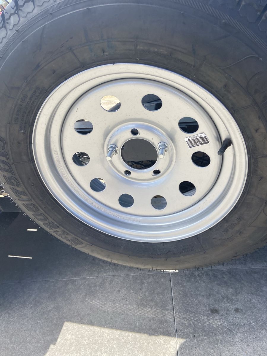205/75/15 Brand New spare trailer tire with silver mod rim