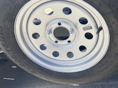 205/75/15 Brand New spare trailer tire with silver mod rim