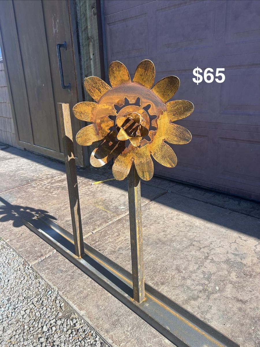Handmade metal yard flower rusted patina