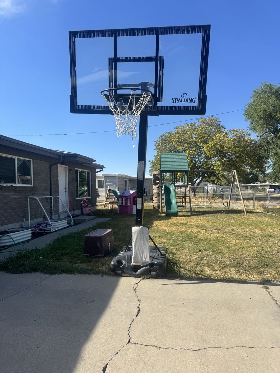 Spalding Portable Basketball Hoop System with Clear Acrylic Backboard, Adjustable Height
