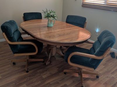 Oak table with 4 chairs.